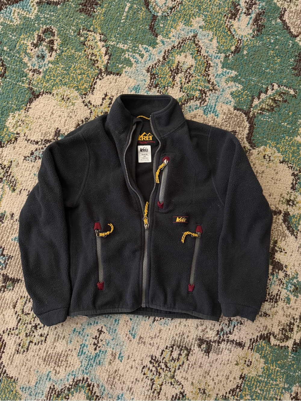 REI Kids Black Fleece Jacket with Yellow and Burgundy Accents